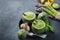 Seasonal creamy asparagus spinach soup served in a round zucchini