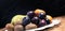 Seasonal fruit selection - plum, banana, kiwi and clementines