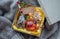Seasonal handmade gift box with Christmas toys, treats, Christmas decor.Top view
