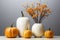 seasonal interior decor for autumn holidays, decorative pumpkins, dried flowers, candles