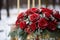 Seasonal sophistication Red roses embellish the winter wedding decor elegantly