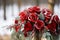 Seasonal sophistication Red roses embellish the winter wedding decor elegantly