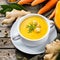 Seasonal spicy fall autumn creamy pumpkin and carrot soup