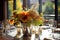 Seasonal table setting with pumpkins and flowers