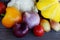 Seasonal vegetables: cauliflower, squash, bell peppers, onions and tomatoes