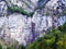 Seasonal waterfalls over the alpine lake Klontalersee