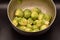 Seasoned Brussel Sprouts on a Black Background