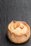 Seasoned cured pork and ham pie on stone background