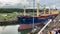 The Seastar Tradition Ship being guided through the Panama Canal by train locomotives called mules