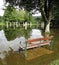 Seat, overlooking flood waters and religious standing stones.