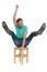 Seated modern man acting like a cowboy riding a chair