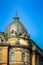 Seated statue of liberty on roof of museum of ethnography in Lviv city, Ucraine