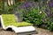 A seating area in a homey, ecological garden.