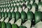 Seating rows in a stadium with weathered chairs