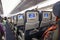 Seating space with multimedia screens economy class airplane cabin