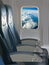 Seating and window inside an aircraft