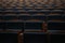 Seats rows in an empty theater hallroom