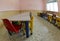 Seats and tables in a refectory of the nursery canteen