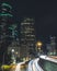 Seattle Cityscape Skyscraper Buildings Above Freeway Long Exposure Car Streaks at Night