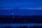 Seattle night view over mountain Olympus, houses