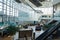 The Seattle Tacoma SEATAC airport atrium with people waiting to get on a plane to travel