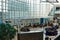 The Seattle Tacoma SEATAC airport atrium with people waiting to get on a plane to travel