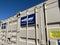 Seattle, WA USA - circa August 2023: Wide view of a Mobile mini storage container in a business parking lot on a bright sunny day