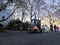 Seattle, WA USA - circa March 2022: View of an orange Toyota work truck clearing metal block-off gates after a marathon race