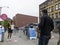 Seattle, WA USA - circa May 2021: An Indian man entering the line at a covid vaccine center at Lumen Field in downtown Seattle