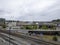 Seattle, WA USA - circa May 2021: View of downtown Seattle on an overcast day, with homeless tents and shelters in sight beneath