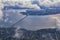 Seattle, Washington, 2019 Cityscape Aerial Panoramic View through cloudscape including Ocean, rivers and rural urban.