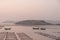 At the seaweed farm before sunrise in the morning, there are seaweed rows and boats