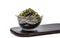 Seaweed kelp Laminaria in a glass bowl, sprinkle sesame seeds on a wooden board, Isolate on white background.