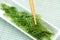 Seaweed Salad, Healthy sea food in the dish. Oval grapes seaweed