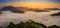 Sebrelje, Slovenia - Aerial panoramic drone view of the beautiful hilltop church of St.Ivan Sv. Ivan Cerkev at sunrise with fog