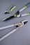 Secateurs, loppers and hedge trimmers for pruning and trimming plants.Steel Garden tool set on gray background..Garden