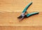 Secateurs on wooden background