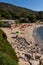 Seccheto, Elba Island, Province of Livorno Italy - 11 June 2022 View over sandy colorful beach of little village