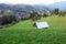 Secluded cabin on a green hill