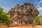 The second level stairs and entrance to the former fortress and monastery of Sigiriya rock, guarded by a pair of lion feet in Sri