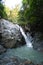 Secret tropical waterfall in jungle on a Samui island.