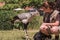 Secretarybird, terrestrial bird of prey. Birds show Zoo employee communicating with a bird
