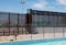 Section of border wall in El Paso, TX showing old style on left and new on right