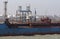 Section of chemical carrier ship discharging cargo at refinery