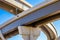 Section of elevated highway with several levels against a bright blue sky