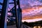 Section of the Lewiston - Clarkston blue bridge against vibrant twilight sky on the border of Idaho and Washington states