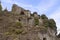 Section of the old Malnido castle ruins in Villafranca in Lunigiana, Italy. Removal of vegetation work in progress