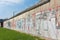 Section of the original Berlin Wall with its current graffiti.