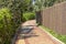 Section of Paved and Patterned Vegetation Lined Beach Walkway