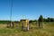 Secured gas station in the field during summer day